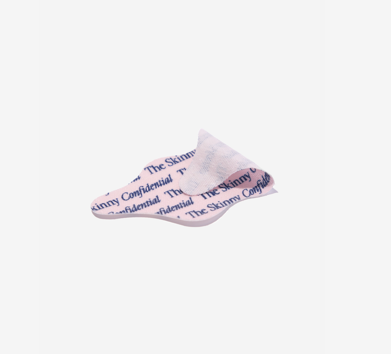A single folded translucent white sheet with repeating dark blue text reading 'The Skinny Confidential' on a plain white background.